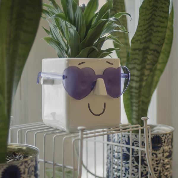 Face Plant planter and eyeglass holder purple heart shaped eyewear living room