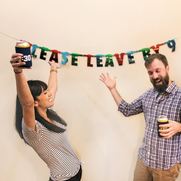 Please leave by 9 party banners woman and man holding beer in can having fun party